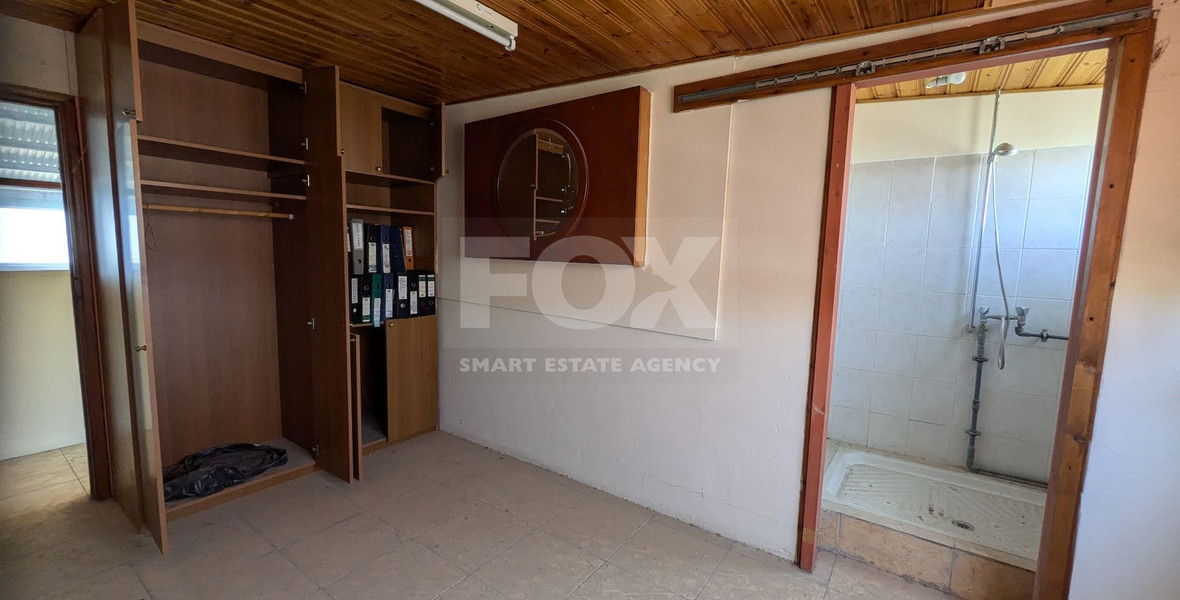 Spacious Warehouse with Large Plot in Agia Varvara, Paphos for sale .