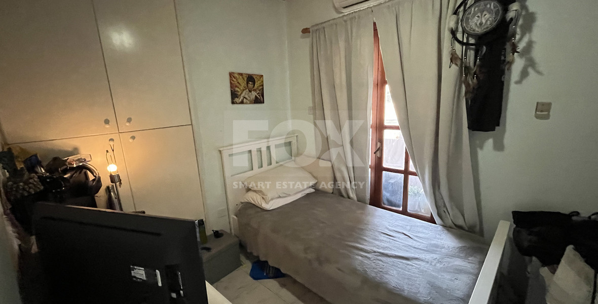 For Sale Two-Story Stone House with Yard at the Heart of Parekklisia