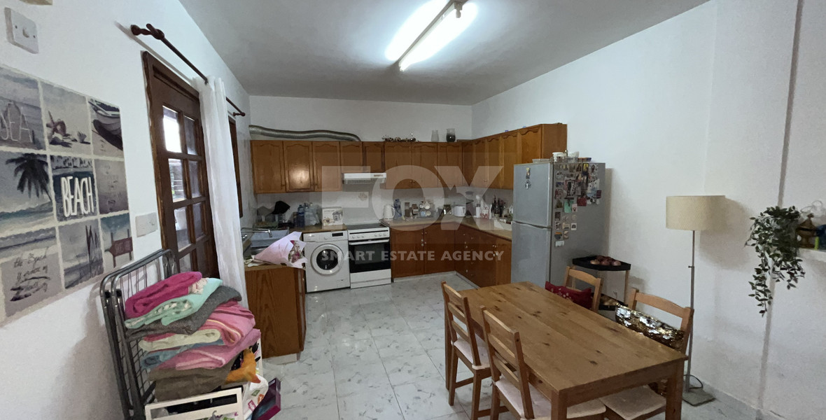 For Sale Two-Story Stone House with Yard at the Heart of Parekklisia