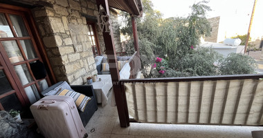 For Sale Two-Story Stone House with Yard at the Heart of Parekklisia