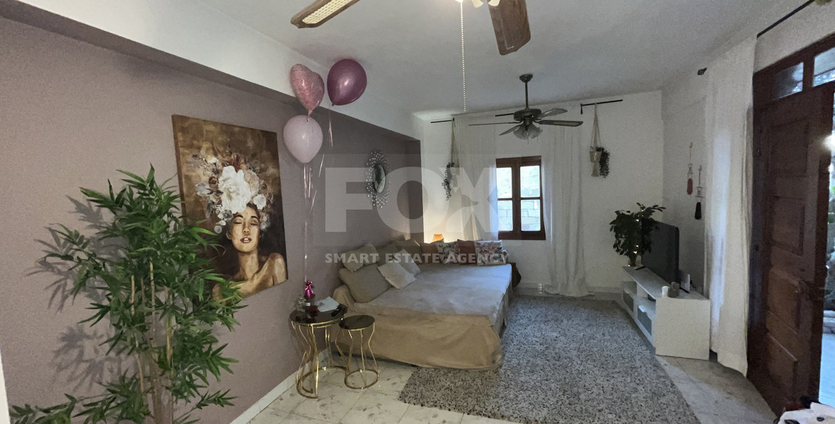 For Sale Two-Story Stone House with Yard at the Heart of Parekklisia