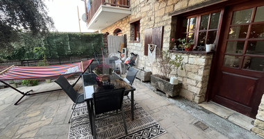 For Sale Two-Story Stone House with Yard at the Heart of Parekklisia