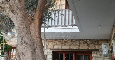 For Sale Two-Story Stone House with Yard at the Heart of Parekklisia