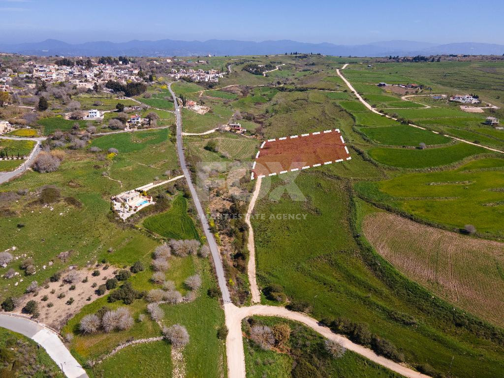 Scenic land for sale in Pano Arodes, Paphos District – ideal for building primary or holiday homes in a peaceful location near amenities.