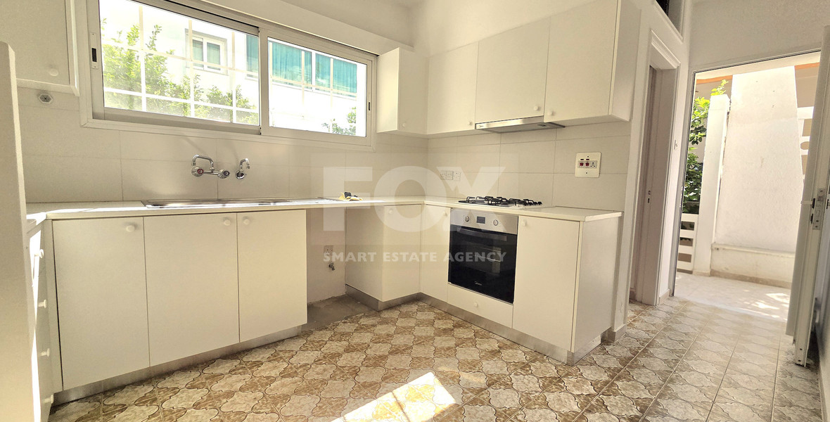 Spacious  four bedroom apartment with  fireplace charm and two large verandas for rent in Katholiki Limassol