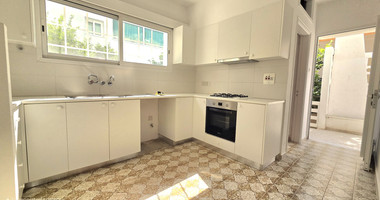 Spacious  four bedroom apartment with  fireplace charm and two large verandas for rent in Katholiki Limassol