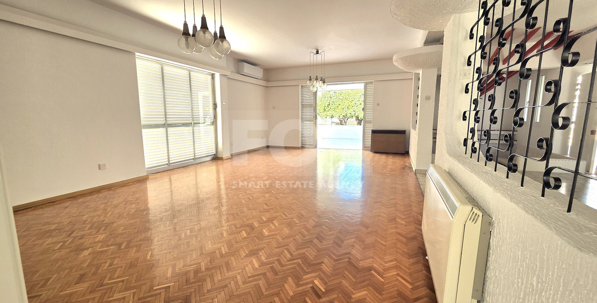 Spacious  four bedroom apartment with  fireplace charm and two large verandas for rent in Katholiki Limassol