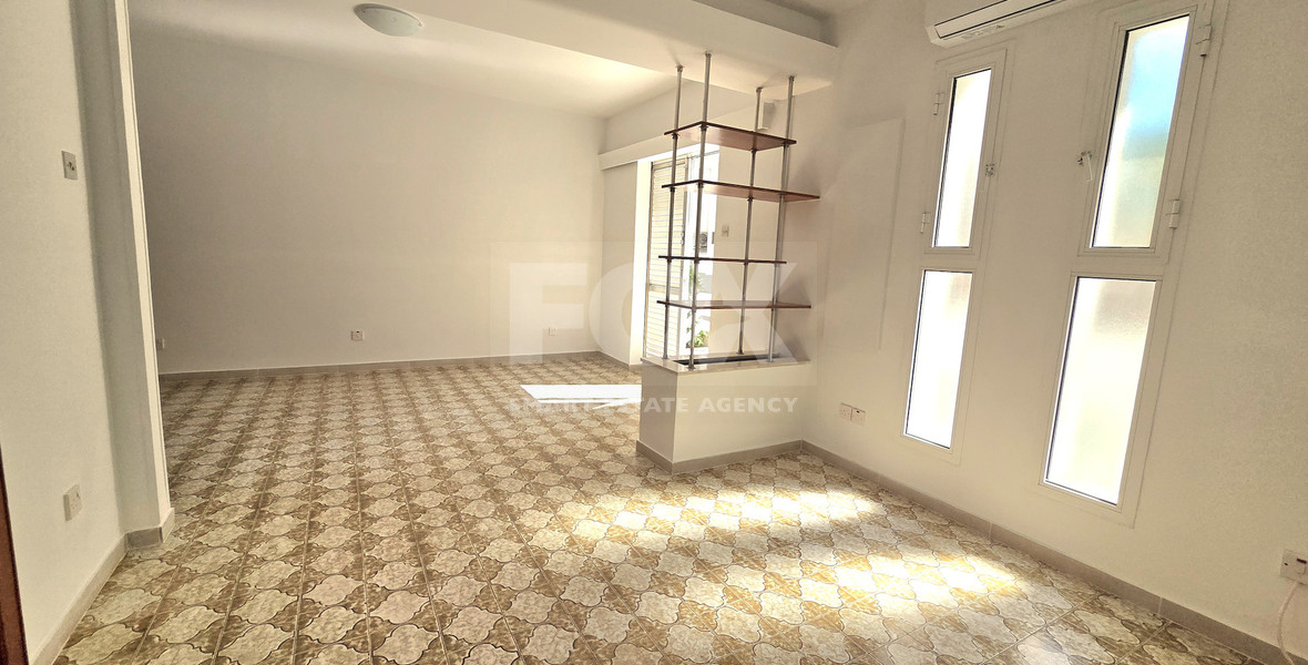 Spacious  four bedroom apartment with  fireplace charm and two large verandas for rent in Katholiki Limassol