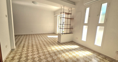 Spacious  four bedroom apartment with  fireplace charm and two large verandas for rent in Katholiki Limassol