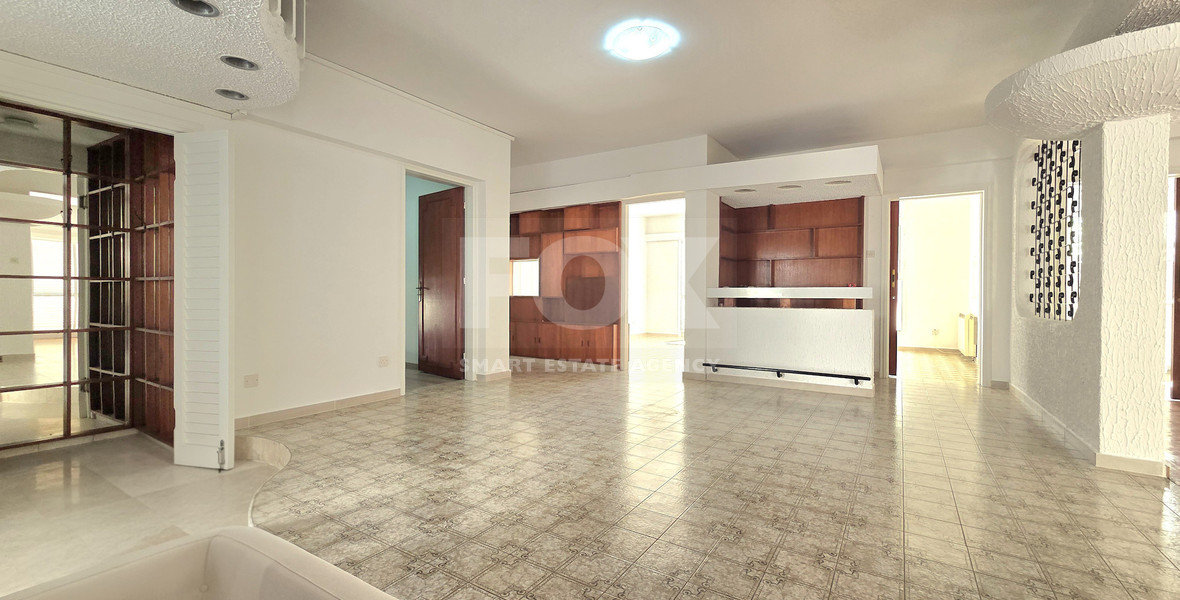 Spacious  four bedroom apartment with  fireplace charm and two large verandas for rent in Katholiki Limassol