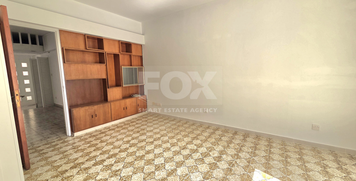 Spacious  four bedroom apartment with  fireplace charm and two large verandas for rent in Katholiki Limassol