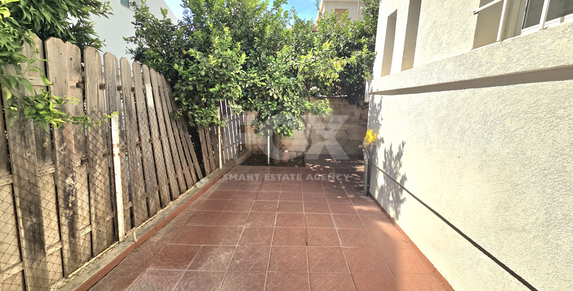 Spacious  four bedroom apartment with  fireplace charm and two large verandas for rent in Katholiki Limassol