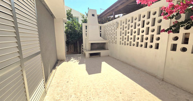 Spacious  four bedroom apartment with  fireplace charm and two large verandas for rent in Katholiki Limassol