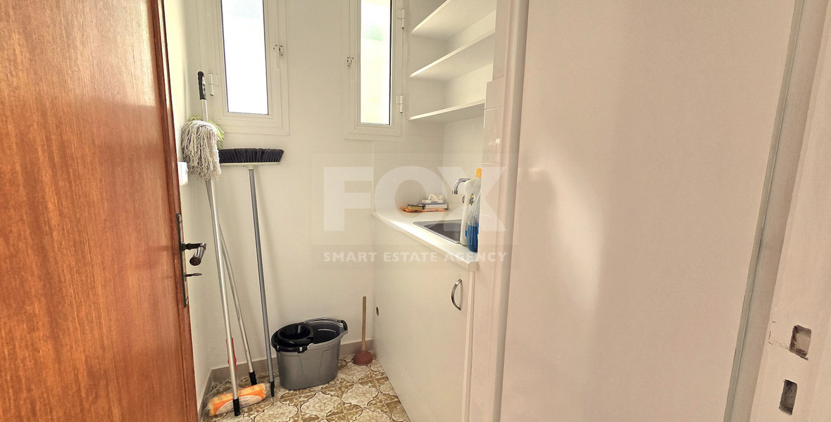 Spacious  four bedroom apartment with  fireplace charm and two large verandas for rent in Katholiki Limassol