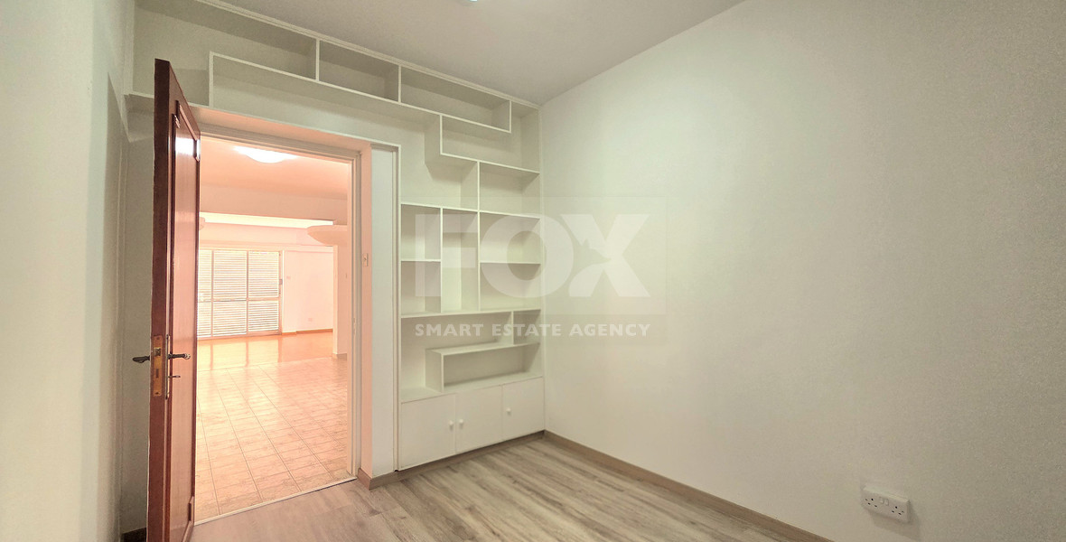 Spacious  four bedroom apartment with  fireplace charm and two large verandas for rent in Katholiki Limassol