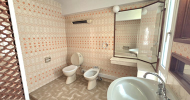 Spacious  four bedroom apartment with  fireplace charm and two large verandas for rent in Katholiki Limassol