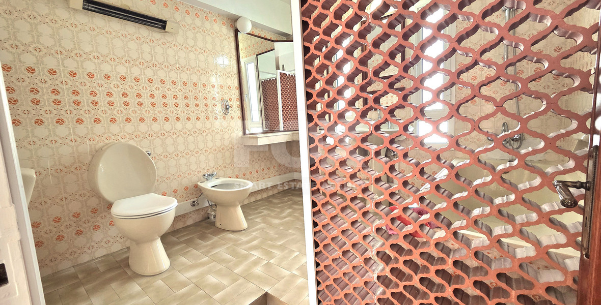 Spacious  four bedroom apartment with  fireplace charm and two large verandas for rent in Katholiki Limassol