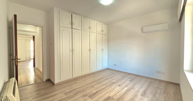 Spacious  four bedroom apartment with  fireplace charm and two large verandas for rent in Katholiki Limassol