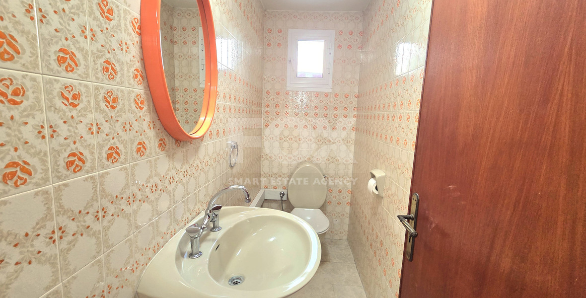 Spacious  four bedroom apartment with  fireplace charm and two large verandas for rent in Katholiki Limassol