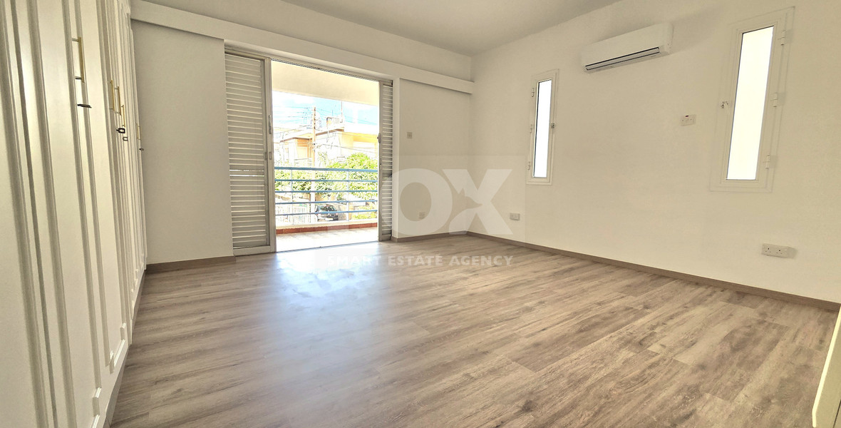 Spacious  four bedroom apartment with  fireplace charm and two large verandas for rent in Katholiki Limassol