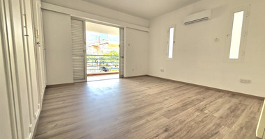 Spacious  four bedroom apartment with  fireplace charm and two large verandas for rent in Katholiki Limassol