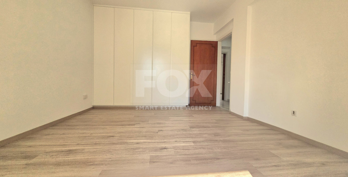 Spacious  four bedroom apartment with  fireplace charm and two large verandas for rent in Katholiki Limassol