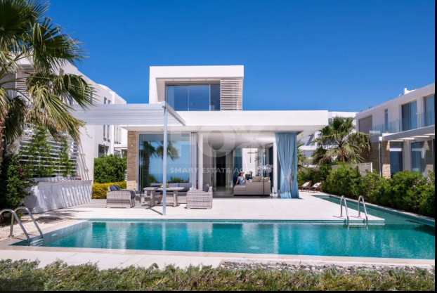 Luxury four bedroom beachfront Villa with Private Pool in Coral Bay , Peyia for sale.