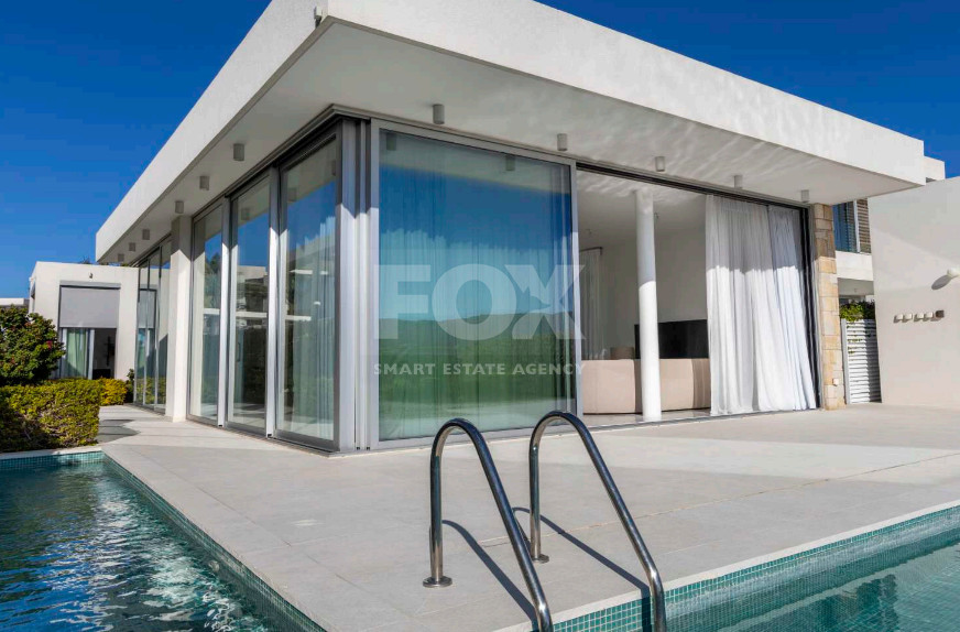 Luxury four bedroom beachfront Villa with Private Pool in Coral Bay , Peyia for sale.