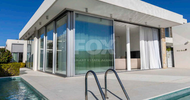 Luxury four bedroom beachfront Villa with Private Pool in Coral Bay , Peyia for sale.