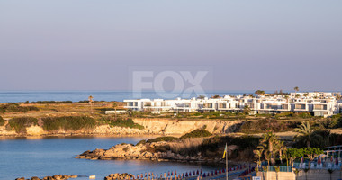 Luxury four bedroom beachfront Villa with Private Pool in Coral Bay , Peyia for sale.