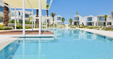 Luxury four bedroom beachfront Villa with Private Pool in Coral Bay , Peyia for sale.