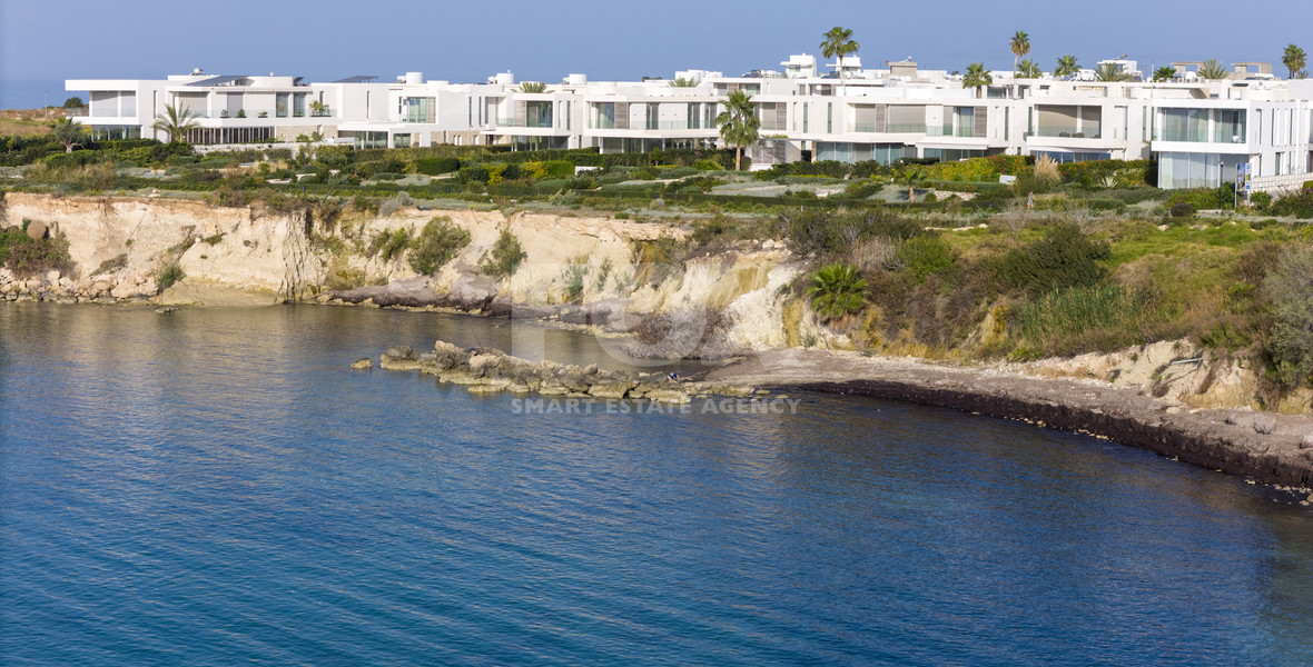 Luxury four bedroom beachfront Villa with Private Pool in Coral Bay , Peyia for sale.