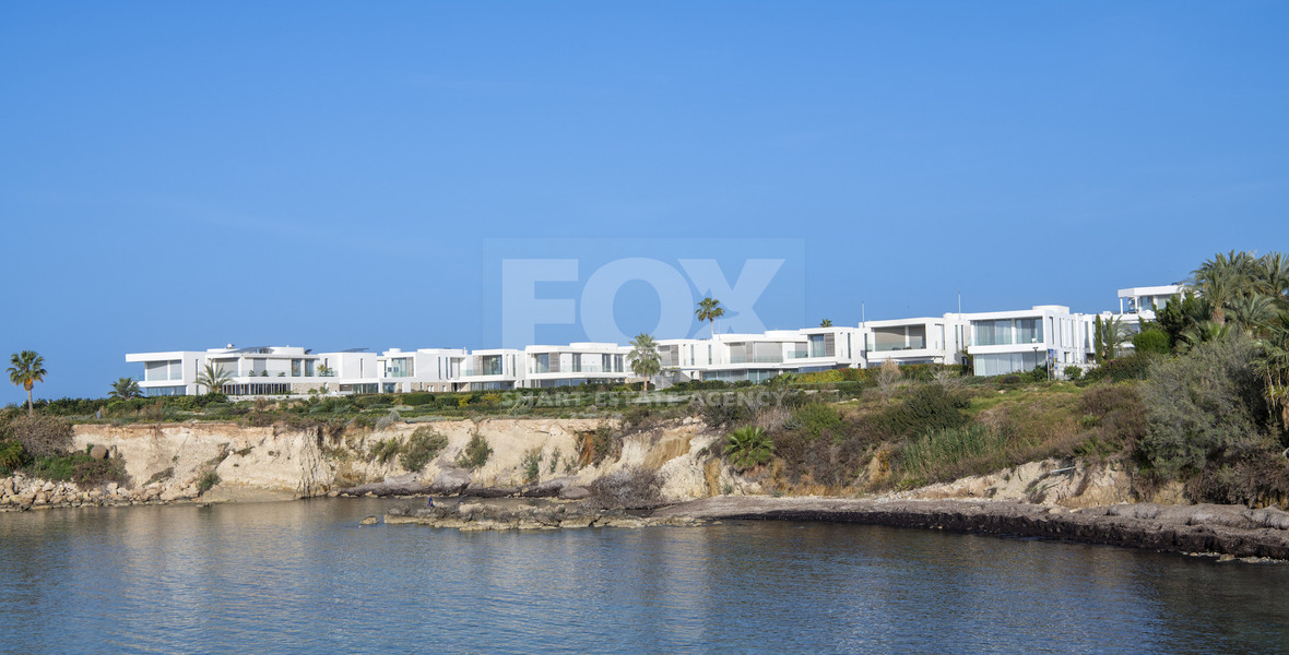 Luxury four bedroom beachfront Villa with Private Pool in Coral Bay , Peyia for sale.