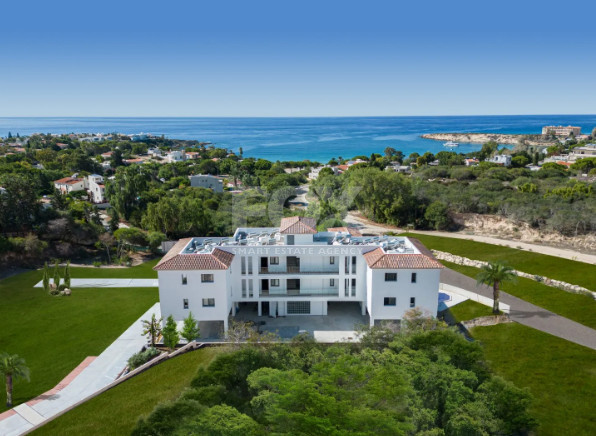 Two Bedroom Two Bathroom Apartment with Pool, Garden, and Spacious Verandas for sale- Ideal Coastal Living in Coral Bay