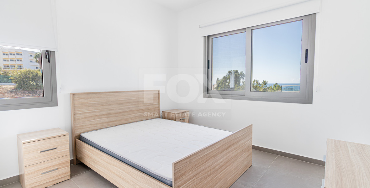 Two Bedroom Two Bathroom Apartment with Pool, Garden, and Spacious Verandas for sale- Ideal Coastal Living in Coral Bay