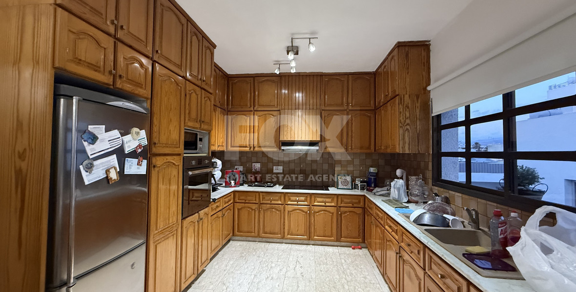 FOR SALE UPPER LEVEL THREE BEDROOM APARTMENT  WITH GARAGE, IN OMONOIA AVENUE OPPOSITE GREEN AREA