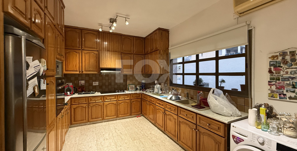 FOR SALE UPPER LEVEL THREE BEDROOM APARTMENT  WITH GARAGE, IN OMONOIA AVENUE OPPOSITE GREEN AREA