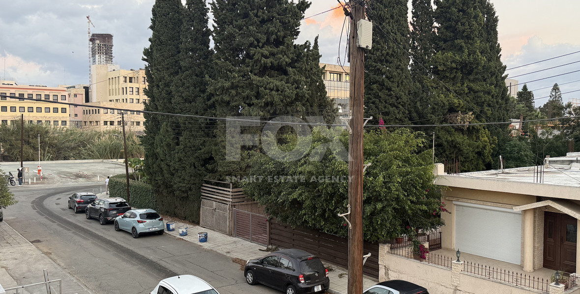 FOR SALE UPPER LEVEL THREE BEDROOM APARTMENT  WITH GARAGE, IN OMONOIA AVENUE OPPOSITE GREEN AREA
