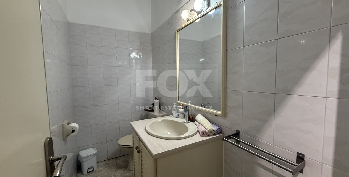 FOR SALE UPPER LEVEL THREE BEDROOM APARTMENT  WITH GARAGE, IN OMONOIA AVENUE OPPOSITE GREEN AREA