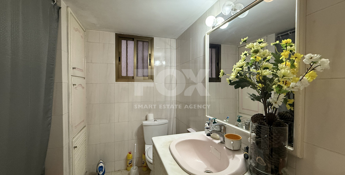 FOR SALE UPPER LEVEL THREE BEDROOM APARTMENT  WITH GARAGE, IN OMONOIA AVENUE OPPOSITE GREEN AREA