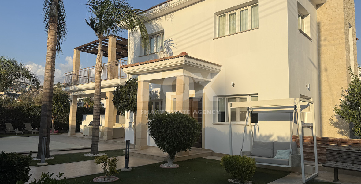 FOR RENT FURNISHED FIVE BEDROOM VILLA IN AGIOS TYCHONAS WITH ALL EN SUITE BEDROOMS , LARGE GARDEN, SWIMMING POOL