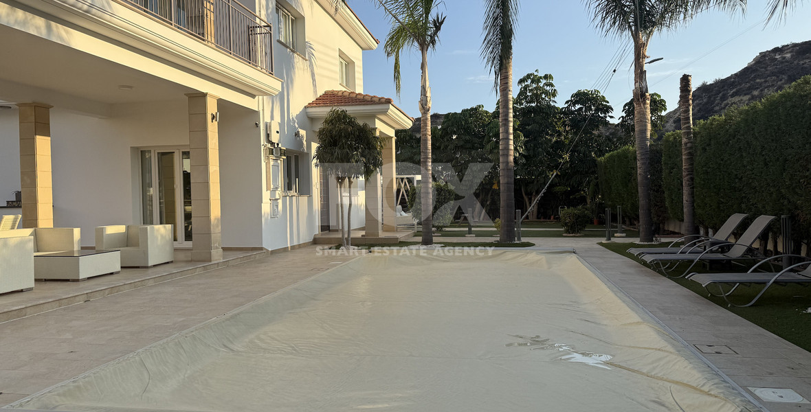 FOR RENT FURNISHED FIVE BEDROOM VILLA IN AGIOS TYCHONAS WITH ALL EN SUITE BEDROOMS , LARGE GARDEN, SWIMMING POOL