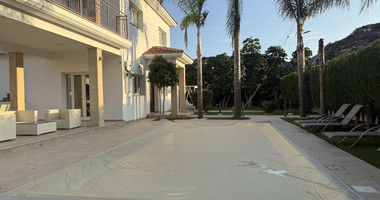 FOR RENT FURNISHED FIVE BEDROOM VILLA IN AGIOS TYCHONAS WITH ALL EN SUITE BEDROOMS , LARGE GARDEN, SWIMMING POOL