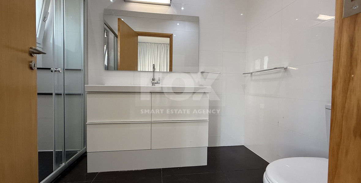 FOR RENT FURNISHED FIVE BEDROOM VILLA IN AGIOS TYCHONAS WITH ALL EN SUITE BEDROOMS , LARGE GARDEN, SWIMMING POOL