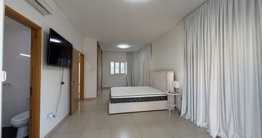 FOR RENT FURNISHED FIVE BEDROOM VILLA IN AGIOS TYCHONAS WITH ALL EN SUITE BEDROOMS , LARGE GARDEN, SWIMMING POOL