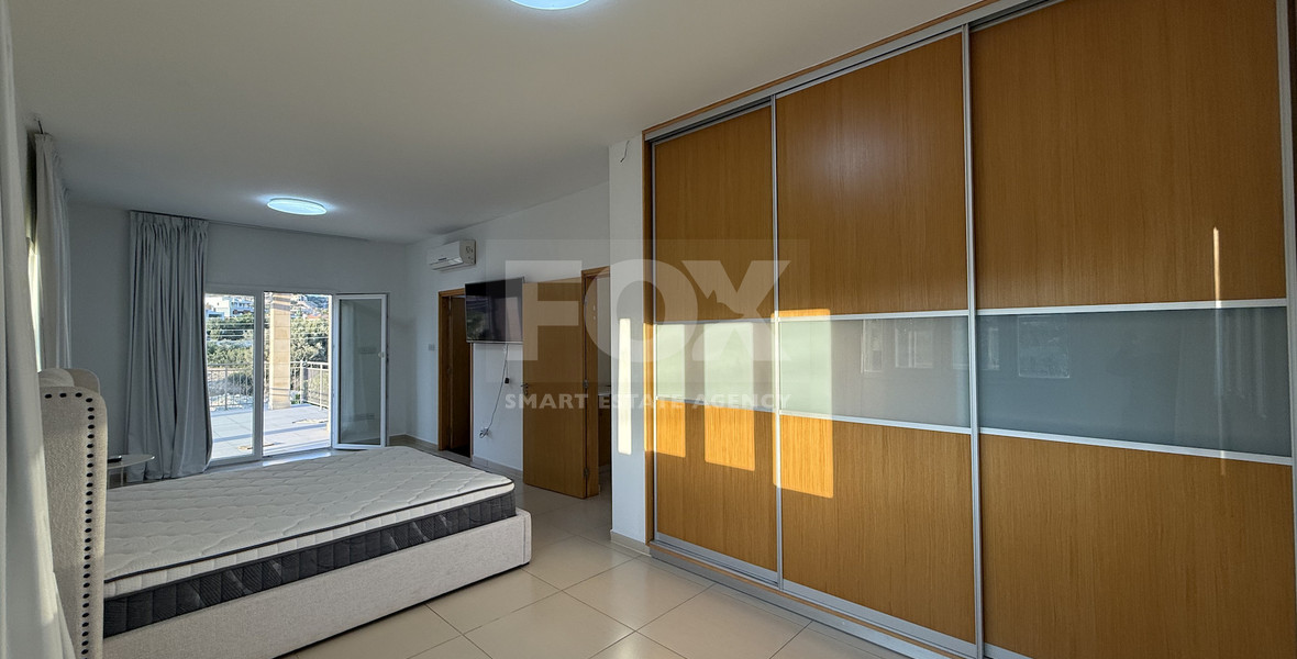 FOR RENT FURNISHED FIVE BEDROOM VILLA IN AGIOS TYCHONAS WITH ALL EN SUITE BEDROOMS , LARGE GARDEN, SWIMMING POOL