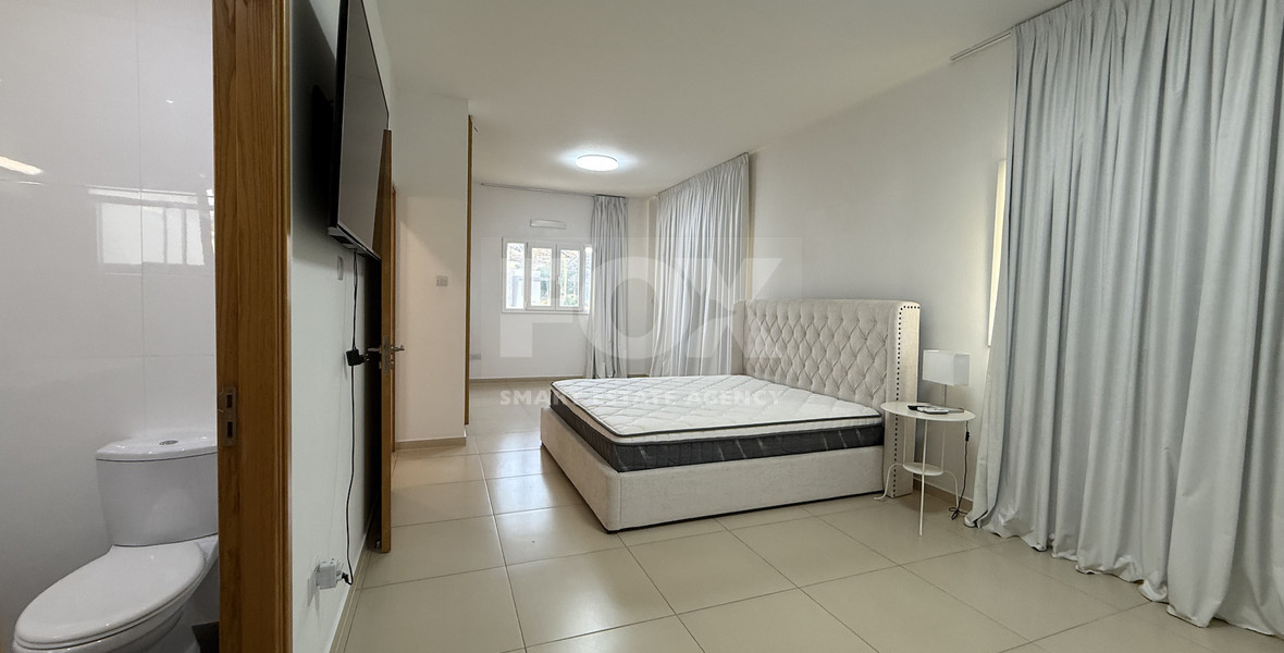 FOR RENT FURNISHED FIVE BEDROOM VILLA IN AGIOS TYCHONAS WITH ALL EN SUITE BEDROOMS , LARGE GARDEN, SWIMMING POOL