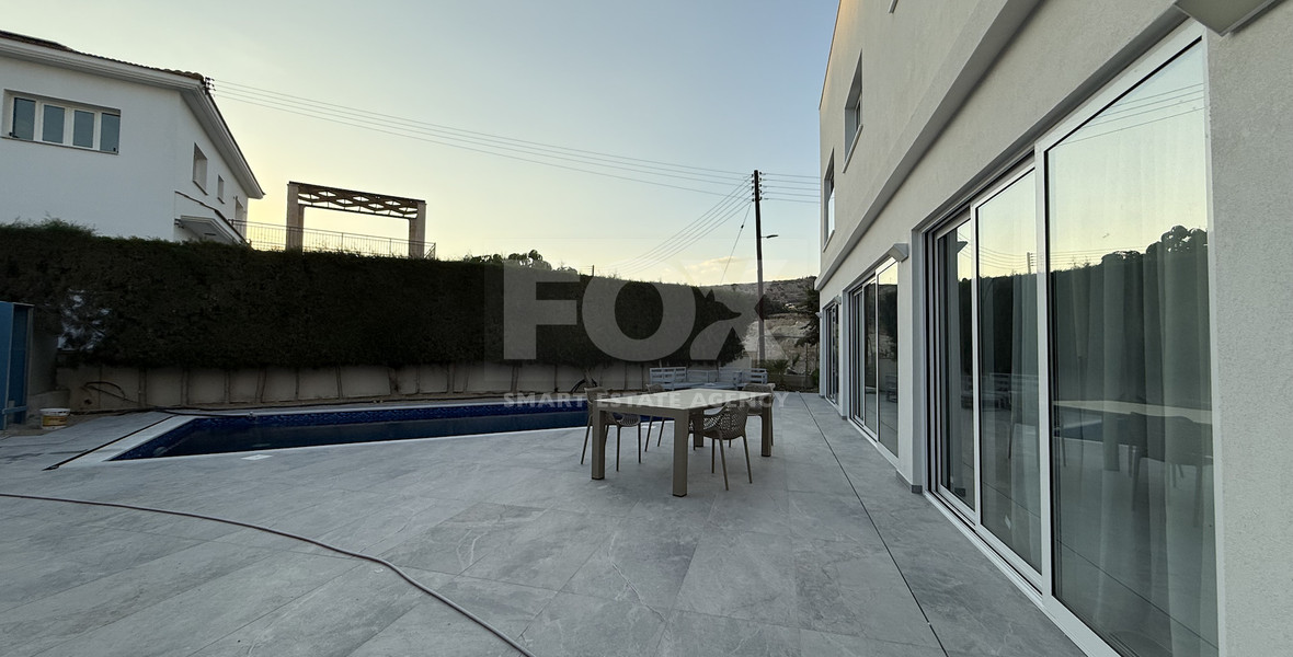 FOR RENT FURNISHED FIVE BEDROOM VILLA IN AGIOS TYCHONAS WITH ALL EN SUITE BEDROOMS , LARGE GARDEN, SWIMMING POOL