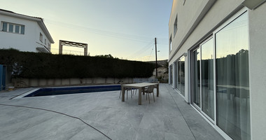 FOR RENT FURNISHED FIVE BEDROOM VILLA IN AGIOS TYCHONAS WITH ALL EN SUITE BEDROOMS , LARGE GARDEN, SWIMMING POOL
