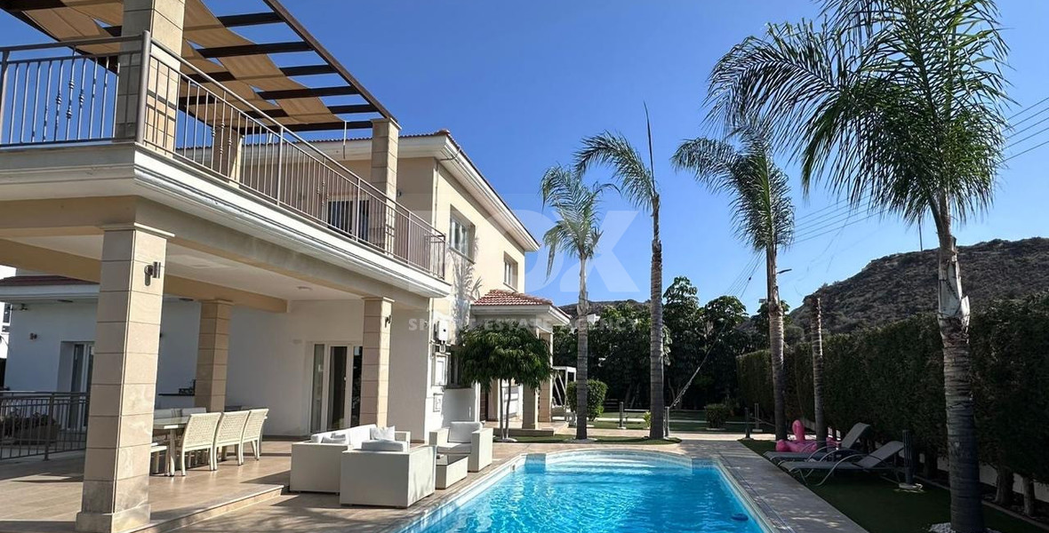 FOR RENT FURNISHED FIVE BEDROOM VILLA IN AGIOS TYCHONAS WITH ALL EN SUITE BEDROOMS , LARGE GARDEN, SWIMMING POOL